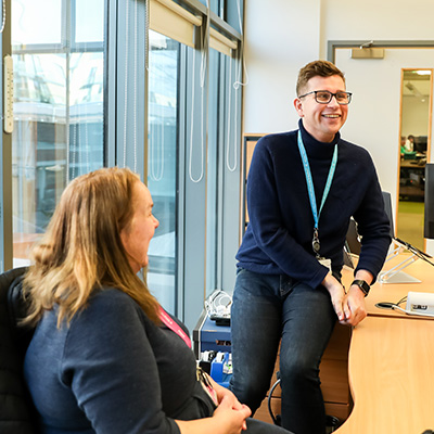 staff members sitting in office 